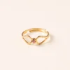 Bague réglable volutes cristal rose doré