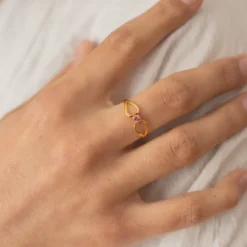Bague réglable volutes cristal rose doré