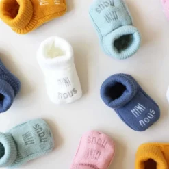 Chaussons naissance - mini nous #d6bab2