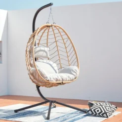 Lima fauteuil suspendu en résine effet rotin naturel