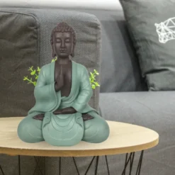 Statue bouddha méditation vert