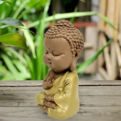 Statuette bouddha toge jaune