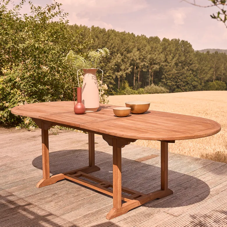 Table de jardin ovale teck huilé 8/10pe