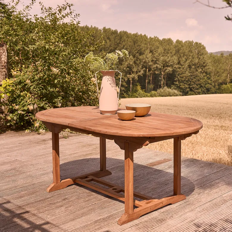 Table de jardin ovale teck huilé 8/10pe
